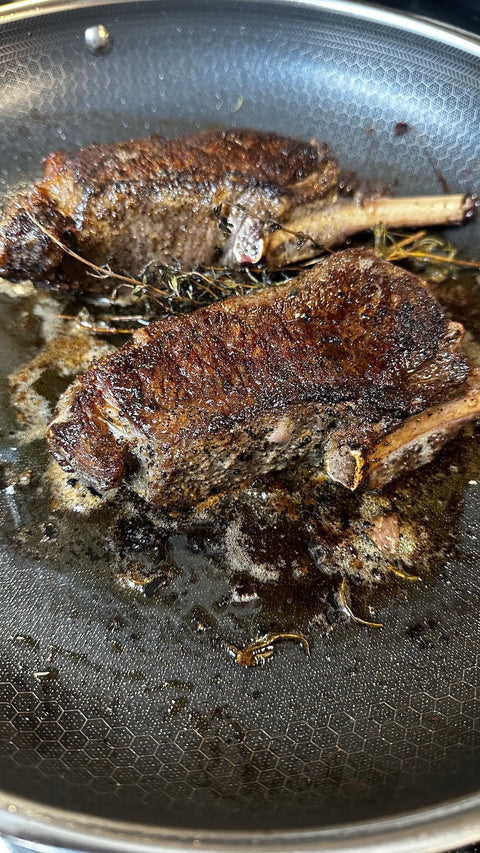 Pan Seared Elk Rib Chops with Garlic and Herb Butter - Jackson Hole Buffalo Meat