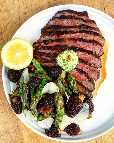  Marinated and Grilled Buffalo Flank Steak with “Caesar” Butter, Morels and Asparagus