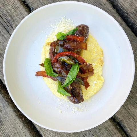 Italian Style Buffalo Sausage Links with Sweet & Sour Peppers and Onions over Ricotta Polenta - Jackson Hole Buffalo Meat
