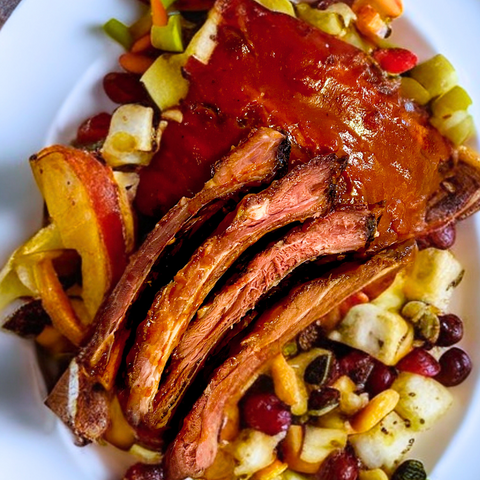 Bison ribs on a plate with harvest salad