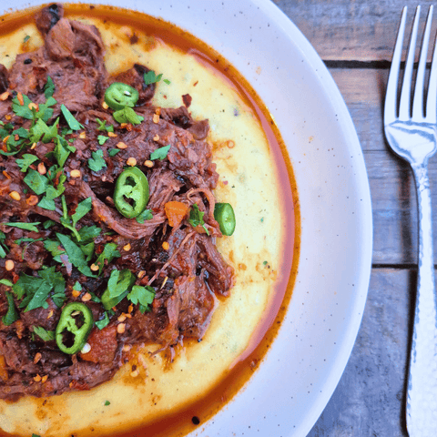 Calabrian Chuck Roast on a bed of parmesan polenta